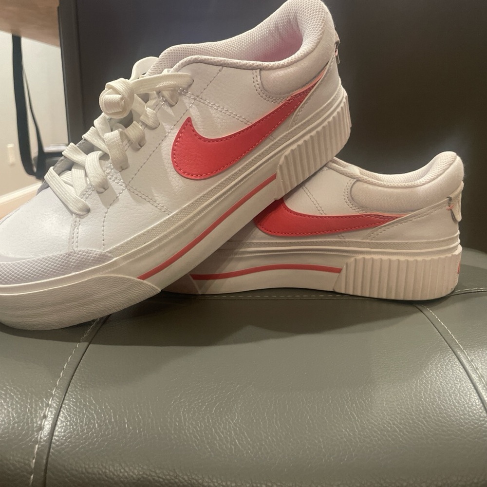 Nike Women's White Sneakers with Coral Pink Swoosh